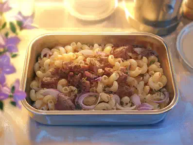 Rezeptbild zu Hühnerherzen mit Hörnchen und Zwiebeln